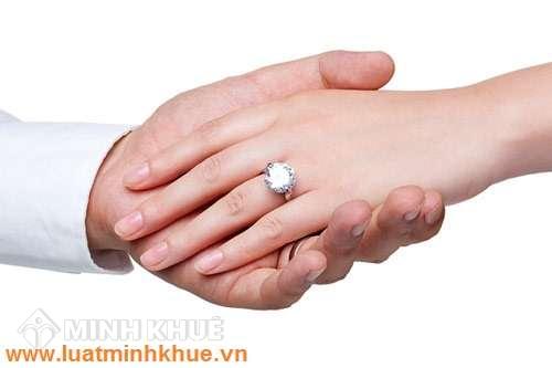 Vấn đề đăng ký kết hôn và làm lại giấy khai sinh cho con ?