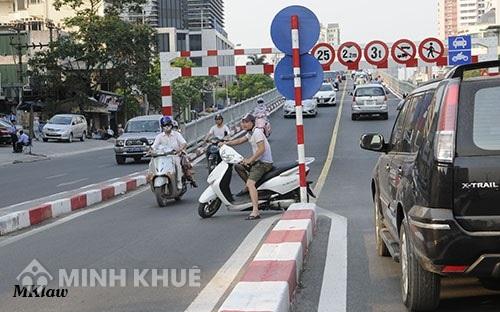 Tư vấn về lỗi vượt nơi có biển báo cấm vượt ?