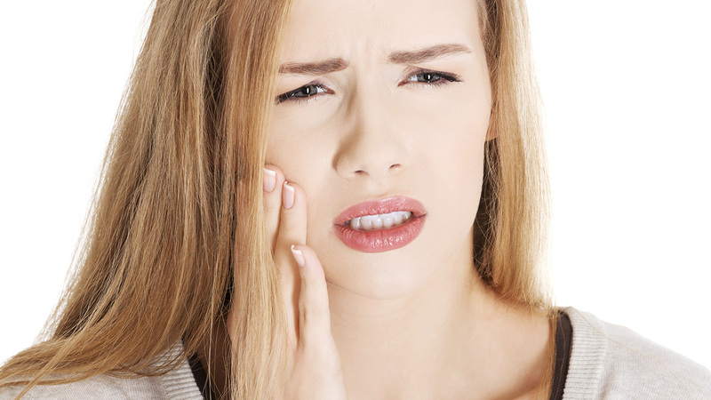 Phải làm thế nào khi mỏi cơ hàm mặt, ?