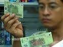 Xài tiền giả bị phạt ít nhất là 3 năm tù