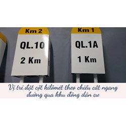 Vị trí đặt cột kilômét theo chiều cắt ngang đường qua khu đông dân cư