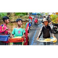Lợi dụng trẻ em bán hàng rong kiếm tiền có bị xử phạt không?