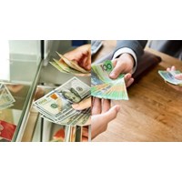 Tổ chức kinh tế được làm đại lý đổi tiền của nước chung biên giới?