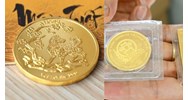 Đồng xu đúc bằng vàng có phải là vàng miếng hay không?