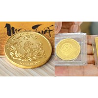 Đồng xu đúc bằng vàng có phải là vàng miếng hay không?