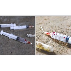 Người nhiễm HIV cố tình rải kim tiêm dính máu tại nơi công cộng bị truy cứu về tội danh nào?