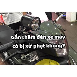 Gắn thêm đèn xe máy có bị xử phạt không ?