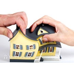 Muốn ly hôn nhưng sổ đỏ đang thế chấp ngân hàng thì phải làm sao?