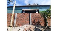 Cho hàng xóm mượn tường xây nhà, đang thi công muốn đòi lại được không?