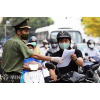 Pháp luật quy định như thế nào về việc sử dụng và làm giả giấy đi đường trong thời gian giãn cách xã hội ?
