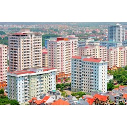Điều kiện chuyển nhượng quyền sử dụng đất gắn với việc chuyển nhượng một phần hoặc toàn bộ dự án đầu tư xây dựng kinh doanh nhà ở?
