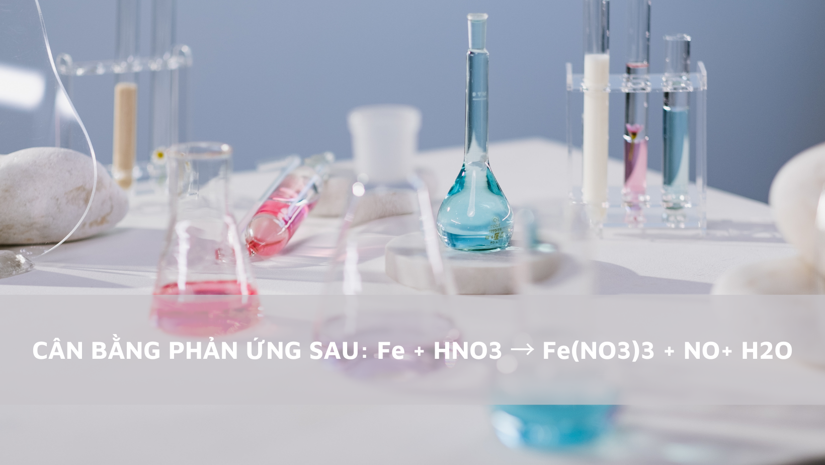 Cân bằng phương trình hóa học Fe2O3 + HNO3 → Fe(NO3)3 + H2O