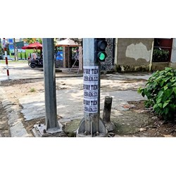 Dán tờ rơi lên cột điện có bị xử phạt?